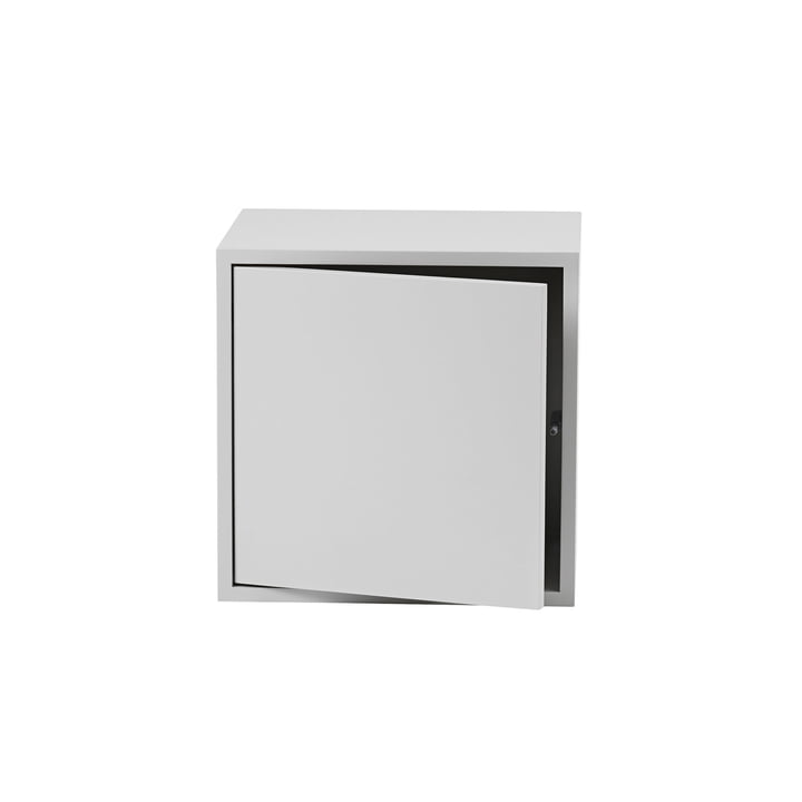 Le Stacked module d'étagères avec porte de Muuto en medium, gris clair