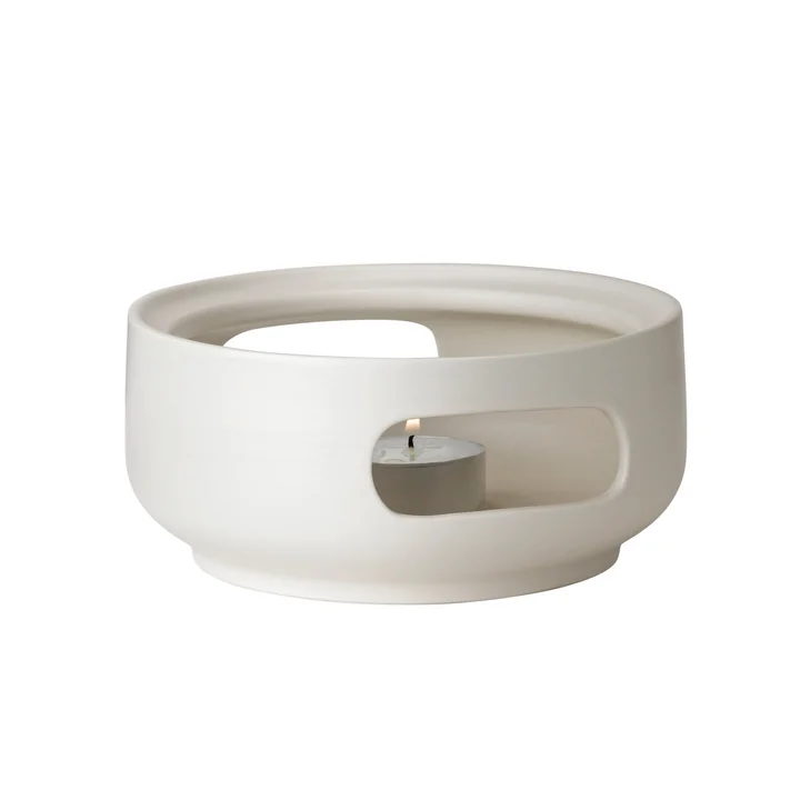 Theo Stövchen de Stelton dans le sable