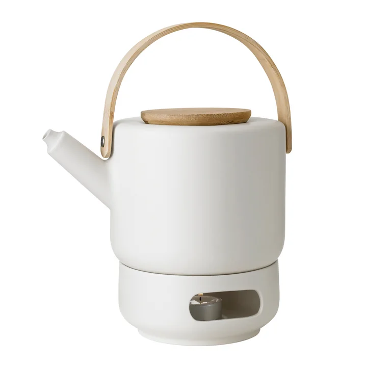 Theo Théière avec réchaud de Stelton in sand