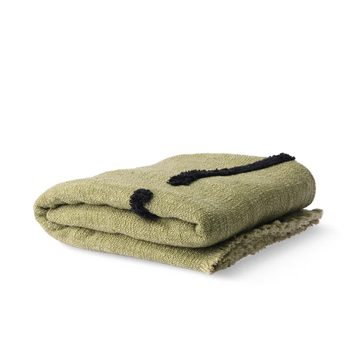 La couverture avec motif à rayures tuftées et franges de HKliving