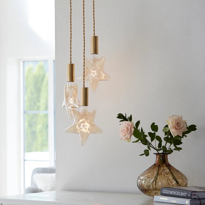 LED Star, E 27 / 0,75 W, or ambre, dimmable de NUD Collection