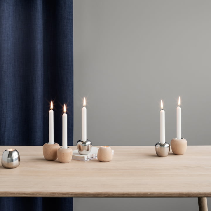 Les Ora chandeliers de Stelton dans leurs différentes versions sur la table à manger