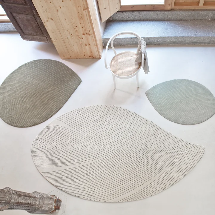 Tapis précieux en forme de feuille