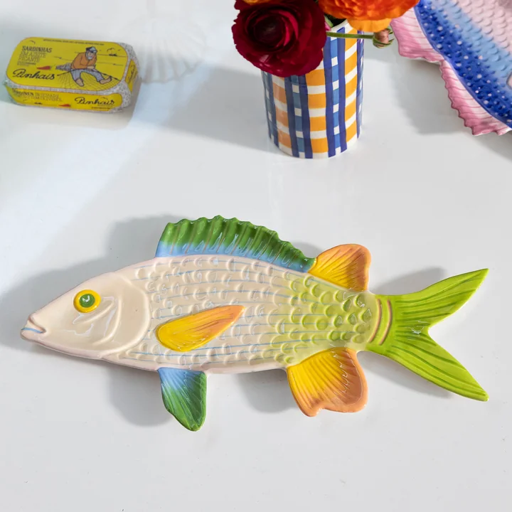 & klevering - Fish plat de service, Trigger