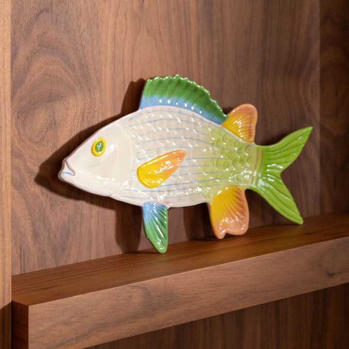 & klevering - Fish plat de service, Trigger