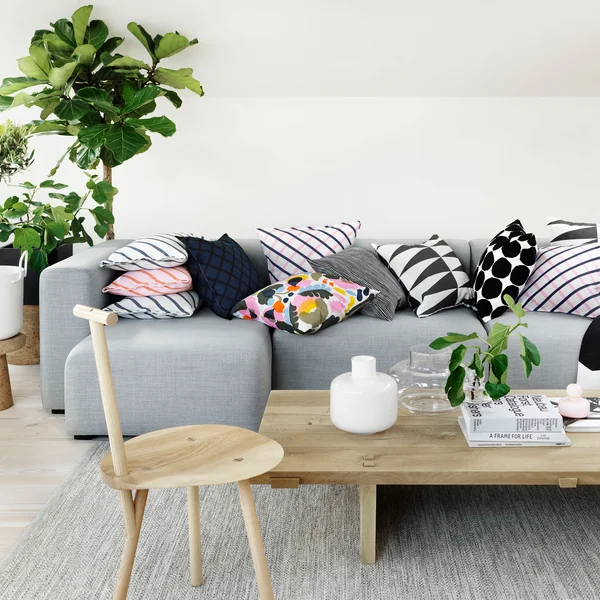 Les housses de coussin Mint de Marimekko sur le canapé